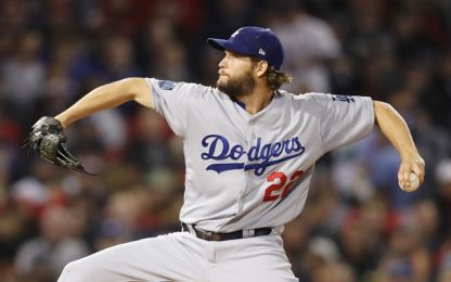 BOSTON, MA - OCTOBER 23: Clayton Kershaw #22 of the Los Angeles Dodgers delivers the pitch during the first inning against the Boston Red Sox in Game One of the 2018 World Series at Fenway Park on October 23, 2018 in Boston, Massachusetts.